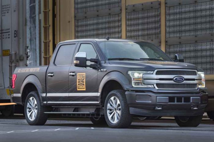 Ford takes on Tesla with a new all-electric F-150 truck that pulls over a million-pound train