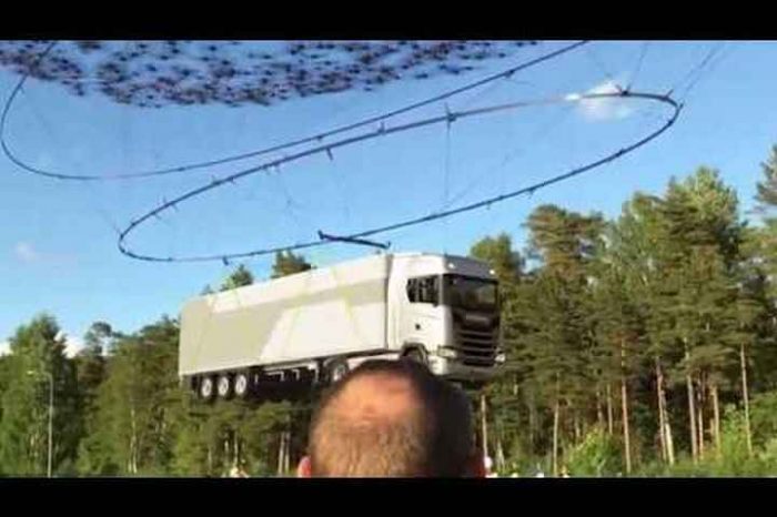 Can you pick up a 40-ton truck with 2,000 drones?