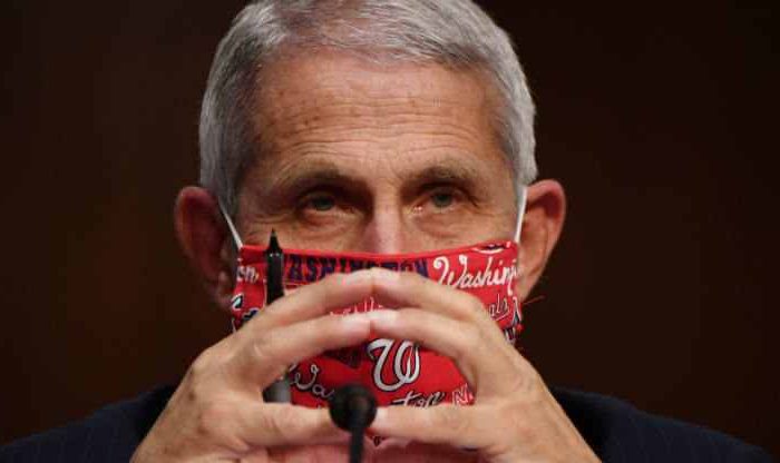 Dr. Fauci says it might be time to mandate masks as coronavirus cases surge across the US