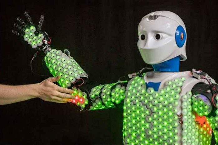 Scientists developed artificial human skin that enables robots to feel and respond to physical contact