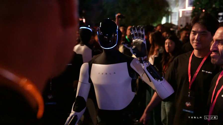 Tesla’s Optimus bot impresses at 'We, Robot' event: "Learn to be as human as you guys are"